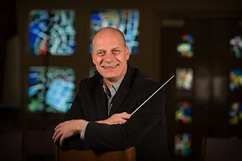 Dr. Ernest Pereira, Music Director and Conductor