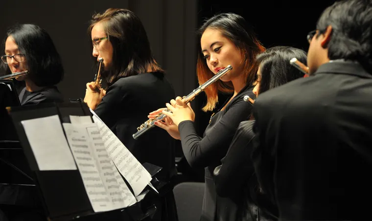Members of the YOC Flute Choir performing